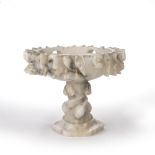 Alabaster centrepiece with fruit carved border, 31cm