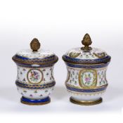 Near pair of French porcelain jars and covers with ormolu mounts decorated with flowers and Sèvres