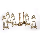 Pair of brass candlesticks 19th Century, 24cm and five gilt metal stands (7)