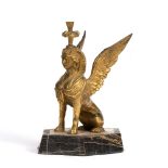 Ormolu sphinx 19th Century, of classical form and on a shaped marble base, 16cm across x 16.5cm