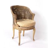 Gilt painted bergere caned armchair French, early 20th Century, 88cm high