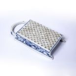 Blue and white porcelain grater Continental, decorated in underglaze blue with onion pattern, 22.5cm