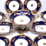 English porcelain fruit set mid 19th Century, each piece with cobalt and gilt and peach border,