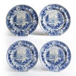 Four Turner pottery blue transfer dishes decorated to the centre, with a floral border, 22cm