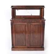 Rosewood chiffonier Late Regency / William IV, having a mirrored raised back inset mirror, carved