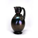 Iridescent glass jug 19th Century of classical form, 20cm high