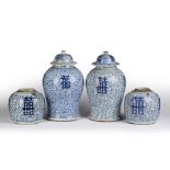 Two similar blue and white baluster lidded vases Chinese, 19th Century, decorated to the body with