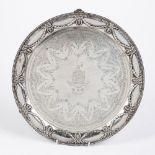 Large Victorian silver salver with husk and swag decoration, standing on three feet, bearing marks