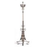In the manner of W A S Benson (1854-1924) Adjustable lamp standard, wrought metal on quadripartite
