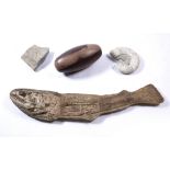 Four large fossil/specimens including ammonite, fossilised fish 86cm, a Shiva Lingam stone stand
