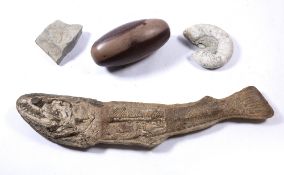 Four large fossil/specimens including ammonite, fossilised fish 86cm, a Shiva Lingam stone stand