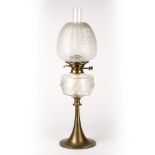 Late 19th Century oil lamp, etched aesthetic shade, with cut glass reservoir on brass stand, 65cm