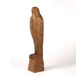 Cotswold School carved oak model of a bird, signed with initials and dated 1967 to the base, 45cm