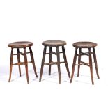 Late 19th Century matched set of three stools with X stretchers, two are 53cm x 36cm the other is