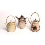 Mary Rich (b. 1940) Three studio pottery miniature teapots, each with impressed seal mark to base,