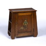 In the manner of Liberty & Co oak smokers cabinet, with transfer applied to the front, unmarked,