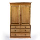 Brown and Lamont Cabinet makers of Chester Light oak, aesthetic movement wardrobe, with a hanging