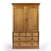 Brown and Lamont Cabinet makers of Chester Light oak, aesthetic movement wardrobe, with a hanging