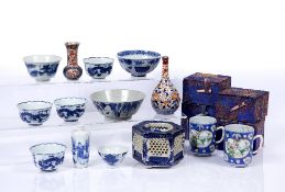 Group of Chinese and Japanese pieces including four Chinese blue and white wine cups, each with