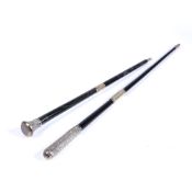 Two silver mounted conductors batons one with hallmarks rubbed and engraved dedication reading 'F.
