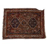 Hamadan rust ground rug with stylised animal foliate and geometric designs, 192cm x 142cm and one