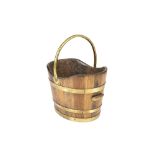 Coopered bucket made from old ship's timber, with brass mounts and handle, indistinct label, 38cm