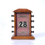 Treen desk calendar early 20th Century, with metal handles, 11.5cm wide x 15cm high Condition: at