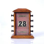 Treen desk calendar early 20th Century, with metal handles, 11.5cm wide x 15cm high Condition: at