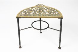 Iron and brass trivet 19th Century, of semi-circular form, 42cm x 33cm x 36cm Condition: some wear