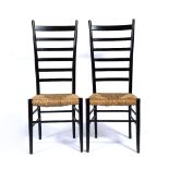 In the manner of Gio Ponti (1891 - 1979) Pair of ladder back chairs with raffia seats, unmarked,