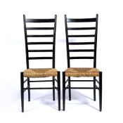 In the manner of Gio Ponti (1891 - 1979) Pair of ladder back chairs with raffia seats, unmarked,