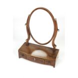 Mahogany bow front dressing table mirror 19th Century, with three small drawers, and ivory