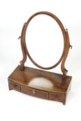 Mahogany bow front dressing table mirror 19th Century, with three small drawers, and ivory
