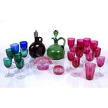 Collection of coloured glassware to include: white metal mounted ruby red glass decanter, a green