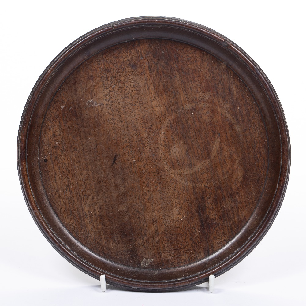 Mahogany small circular wine tray George III, of plain form 22cm diameter Condition: crack from edge - Image 2 of 2