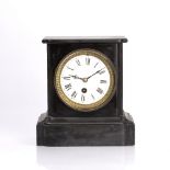 Black slate mantel clock the white enamel dial with Roman numerals, with key, 20cm wide x 21cm high,