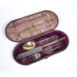 Cased set of silver cutlery consisting of a fork, knife and a spoon, with knights head finials,