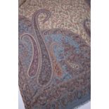 Indian type paisley shawl of blue ground with allover foliate designs, 207cm x 101cm Condition: