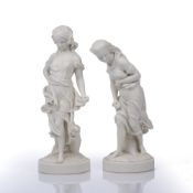 Two parian ware figure groups of ladies on circular bases, both unmarked, 24cm high and 27cm high (