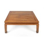 Ming style elm square opium table Chinese, 100cm square, 40cm high Condition: feet worn and chipped,