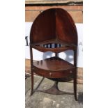 Mahogany corner wash stand 19th Century, with recessed top and folding cover, fitted drawer to the