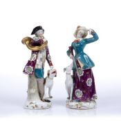 Pair of Chelsea style porcelain figures of the hunter and the huntress, with gold anchor marks to