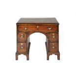 Walnut and herring-bone inlaid kneehole desk 18th Century, fitted one long and four smaller