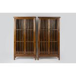 Pair of Ming style elm cabinets Chinese, each with slatted doors enclosing shelves with brass