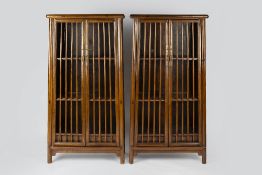 Pair of Ming style elm cabinets Chinese, each with slatted doors enclosing shelves with brass