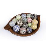 Large treen wooden bowl containing a collection of contemporary ceramic ornaments, the bowl measures