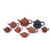 Group of eight Yixing teapots Chinese, including miniature examples Condition: at present, there