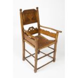 Elm and fruitwood elbow chair Scandinavian, with rush seat and inlaid back panel inscribed Mette