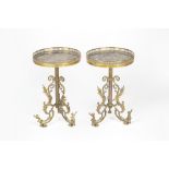 Pair of marble and gilt metal occasional tales with foliate supports terminating in putti, 30cm