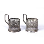 Two filigree cup holders possibly Russian, various marks to the base, 9cm Condition: bumps,